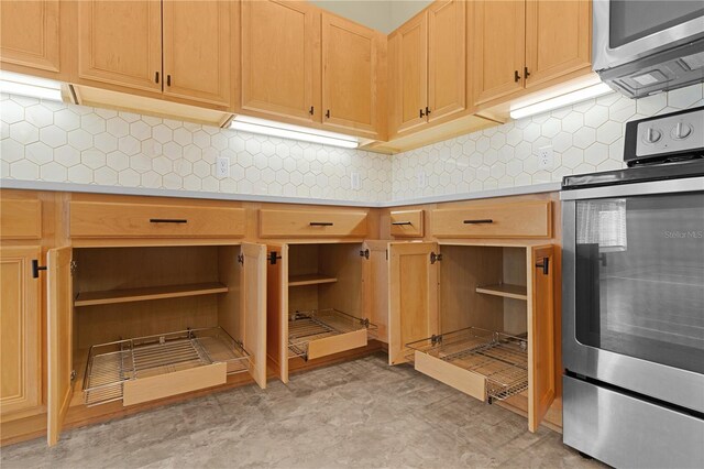 25304 Forest Oak Ct, Leesburg, FL 34748 - kitchen with open shelves, stainless steel appliances, light countertops, and decorative backsplash