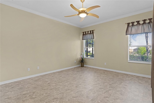 empty room with ceiling fan and crown molding