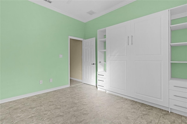 unfurnished bedroom with crown molding