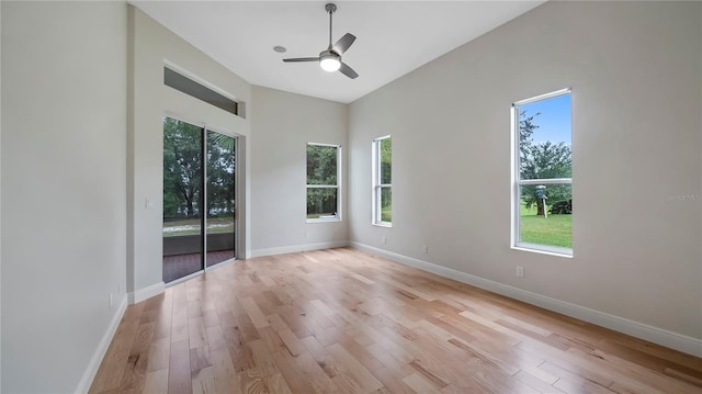 empty room featuring light hardwood / wood-style flooring and ceiling fan