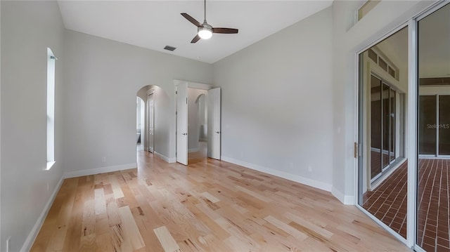 unfurnished bedroom with a closet, light hardwood / wood-style flooring, and ceiling fan