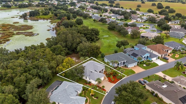 bird's eye view with a water view