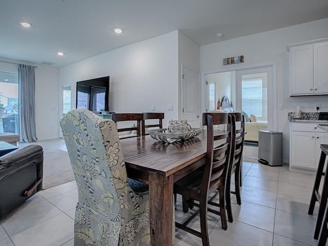 dining room featuring light tile patterned floors