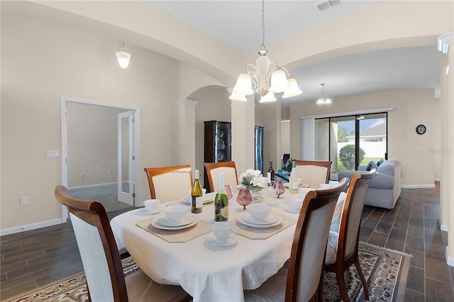 dining area featuring a notable chandelier