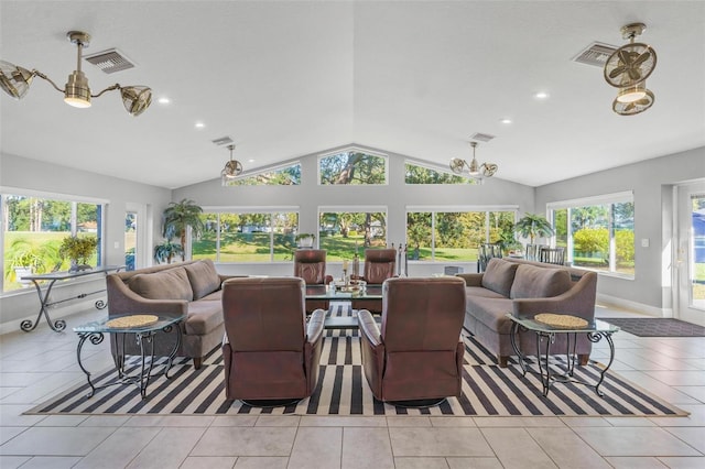 sunroom / solarium featuring lofted ceiling and a healthy amount of sunlight