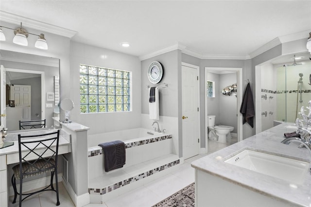 full bathroom featuring separate shower and tub, toilet, vanity, crown molding, and tile patterned floors