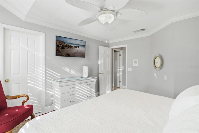 bedroom with ornamental molding and ceiling fan