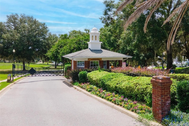 surrounding community featuring a yard