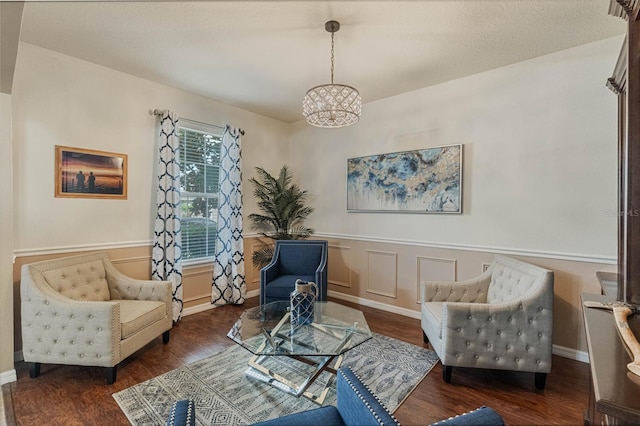 349 Morning View Dr, Winter Garden, FL 34787 - living area featuring a chandelier, wood finished floors, and a wainscoted wall