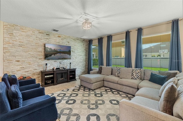 living room featuring a textured ceiling