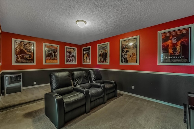 home theater with carpet floors and a textured ceiling