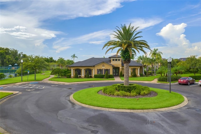 view of front of house with a front lawn