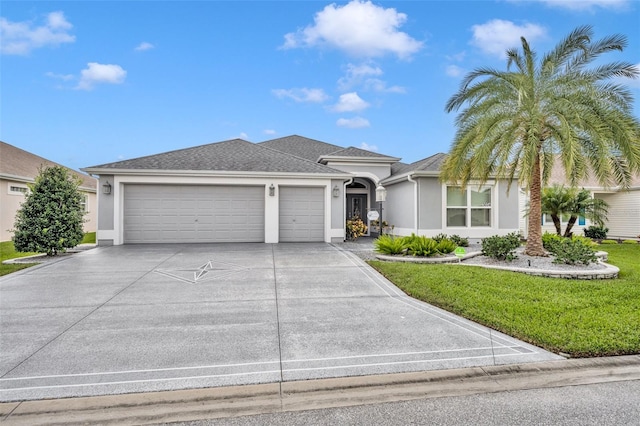 ranch-style house with a front lawn and a garage