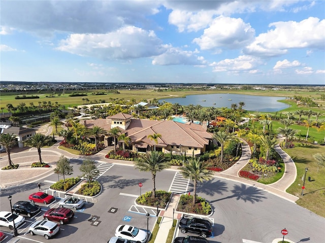 bird's eye view featuring a water view and a residential view