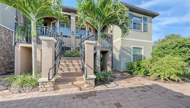 exterior space featuring stucco siding