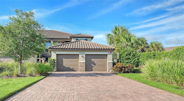 view of front of property featuring a garage