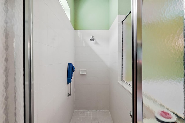 bathroom featuring an enclosed shower