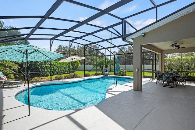 view of pool featuring a lanai, ceiling fan, and a patio area