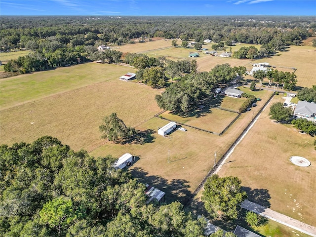 birds eye view of property featuring a rural view