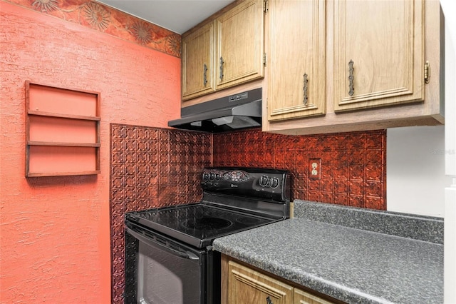 kitchen with electric range and backsplash