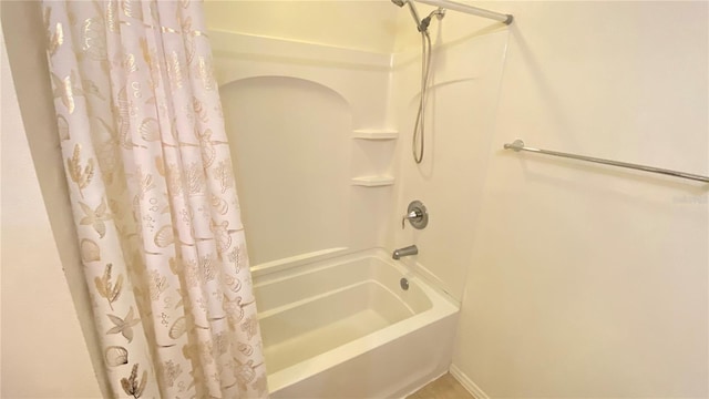 1681 Strathmore Cir, Mount Dora, FL 32757 - bathroom featuring shower / tub combo and baseboards