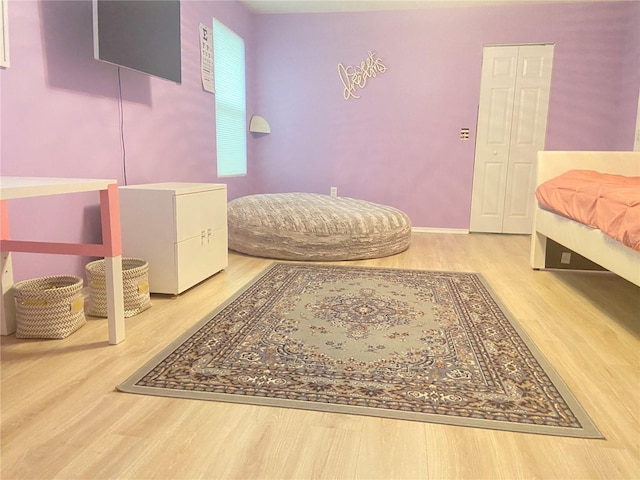 1681 Strathmore Cir, Mount Dora, FL 32757 - bedroom featuring wood finished floors and fridge