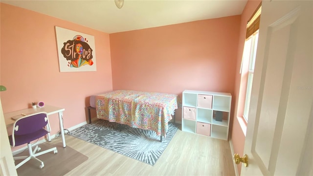 1681 Strathmore Cir, Mount Dora, FL 32757 - bedroom featuring wood finished floors and baseboards