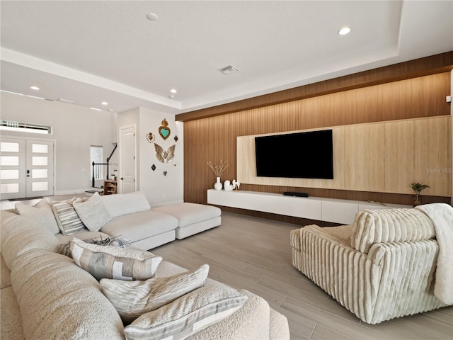 living room with light hardwood / wood-style floors