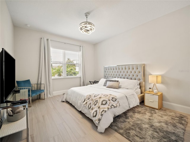 bedroom featuring hardwood / wood-style floors