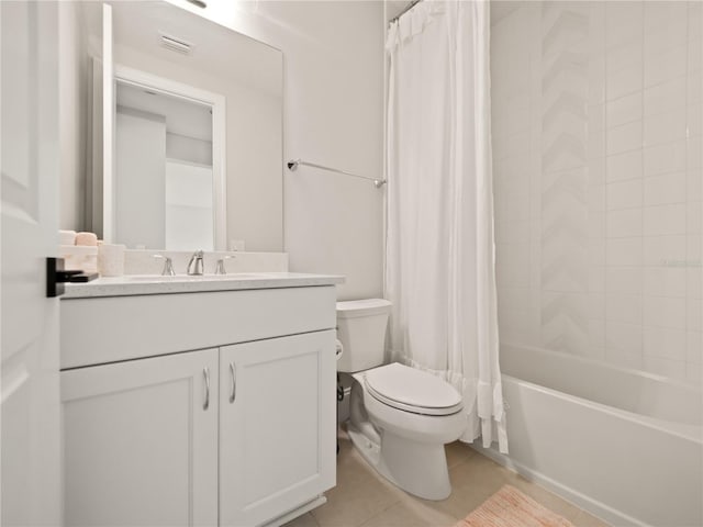 full bathroom featuring vanity, toilet, shower / bathtub combination with curtain, and tile patterned flooring