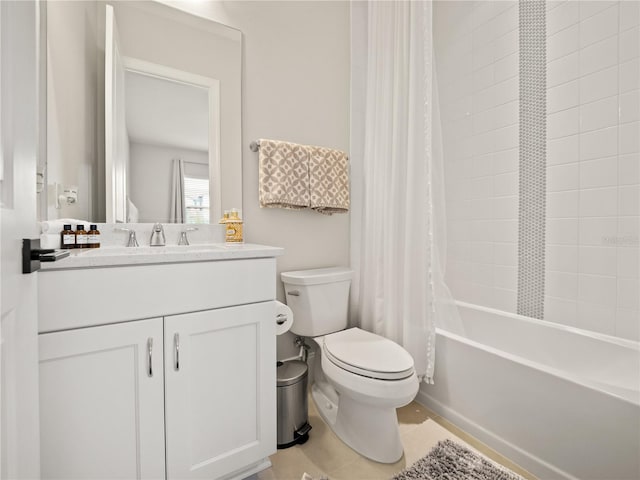 full bathroom featuring vanity, shower / tub combo, toilet, and tile patterned floors