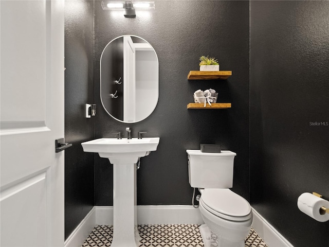 bathroom featuring toilet