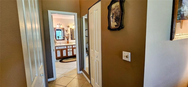 hallway with light tile patterned floors