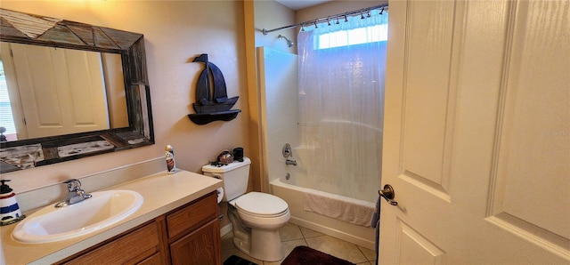 full bathroom with vanity, tile patterned flooring, toilet, and shower / bathtub combination