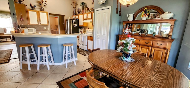 view of tiled dining area