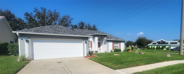 single story home with a front yard and a garage