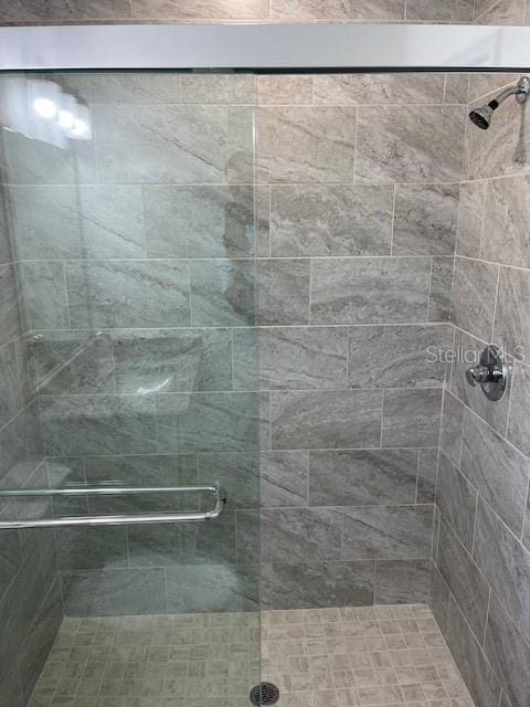 bathroom with an enclosed shower