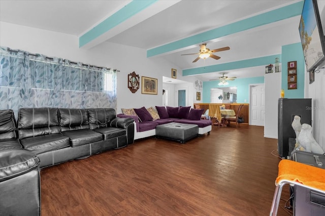 living room featuring beamed ceiling, ceiling fan, and dark hardwood / wood-style flooring