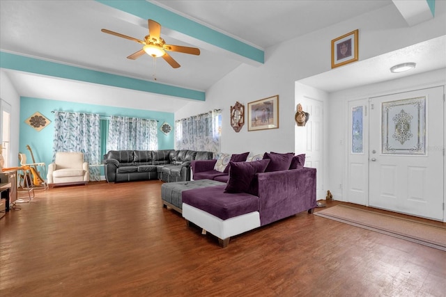 living room with dark wood-type flooring, lofted ceiling with beams, and ceiling fan