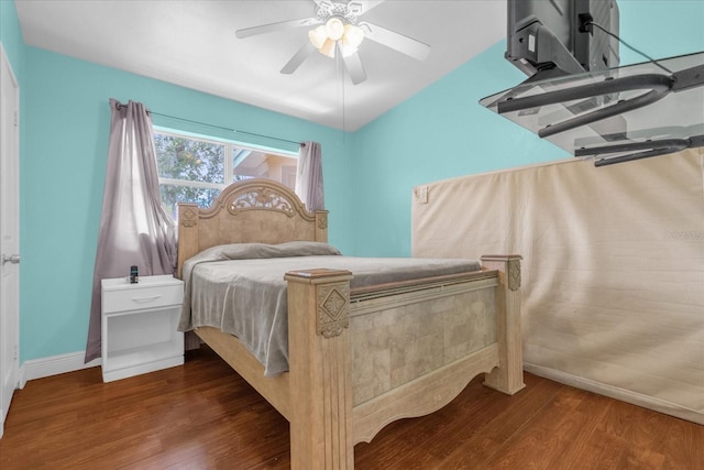 bedroom featuring dark hardwood / wood-style floors and ceiling fan