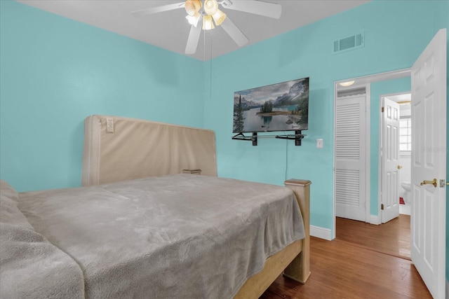 bedroom featuring wood-type flooring and ceiling fan