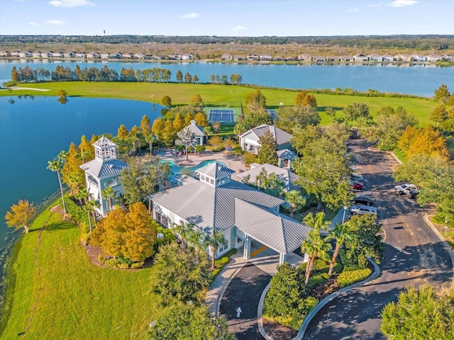 birds eye view of property featuring a water view