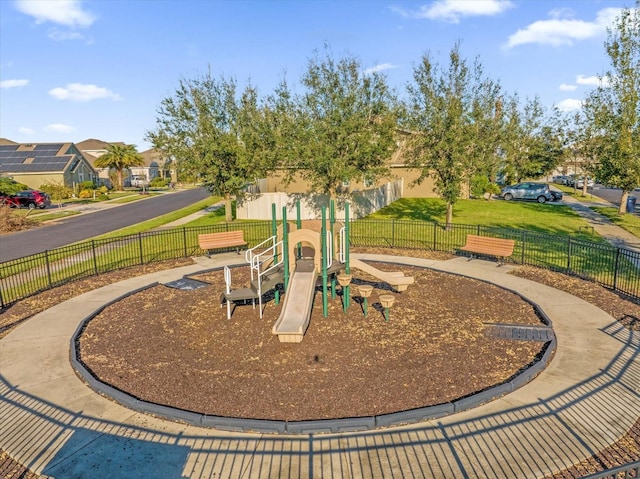 view of playground with a yard