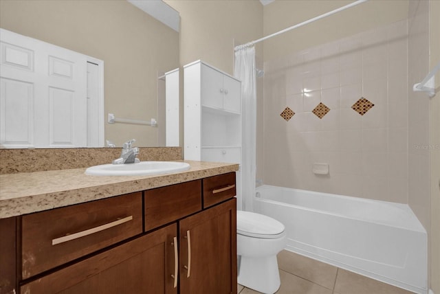 full bathroom featuring toilet, shower / tub combo with curtain, vanity, and tile patterned floors