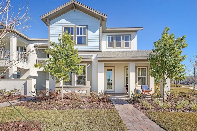 view of front of house featuring a front lawn