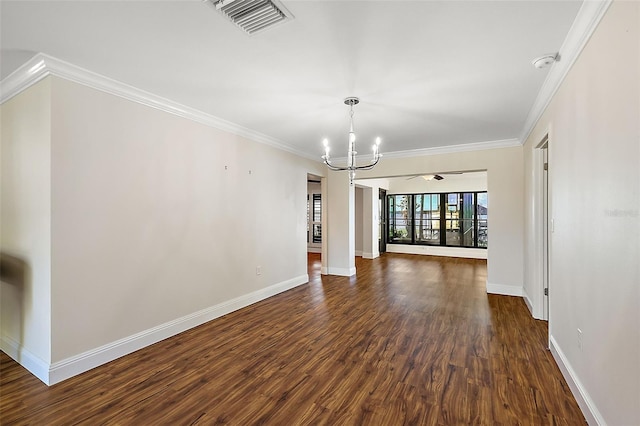 unfurnished living room with crown molding, dark wood-type flooring, and a notable chandelier