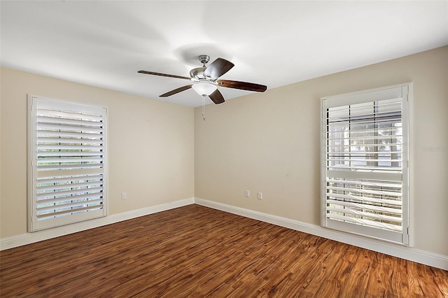 unfurnished room featuring hardwood / wood-style flooring, ceiling fan, and a healthy amount of sunlight