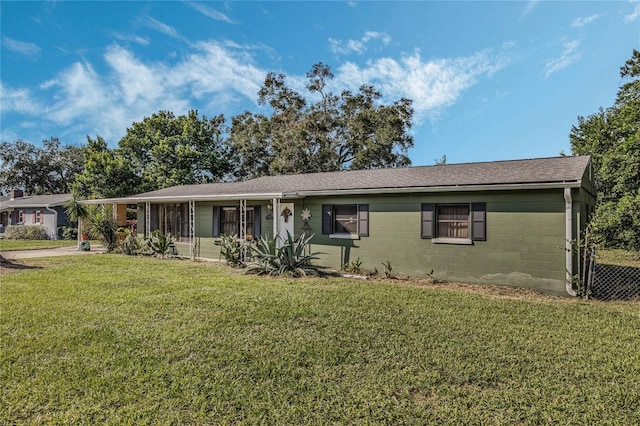 ranch-style home with a front yard