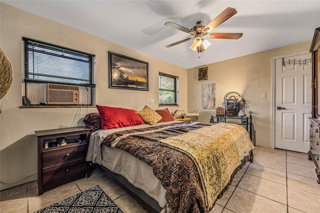 bedroom featuring ceiling fan and light tile patterned floors