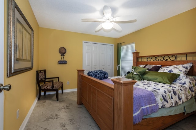 bedroom featuring a closet and ceiling fan